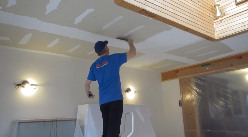 Scraping old stipple and patching ceiling 