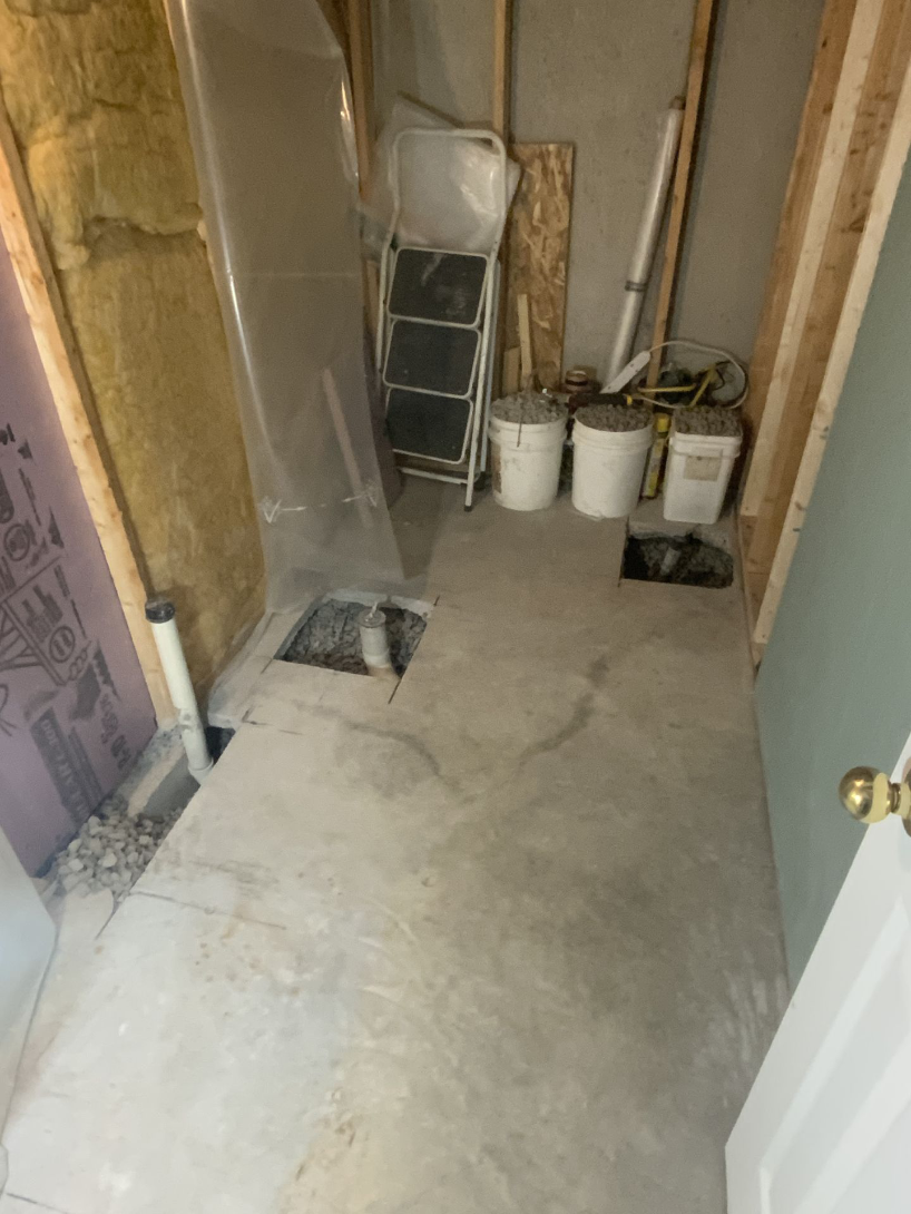 Basement bathroom after plumbing adjustments